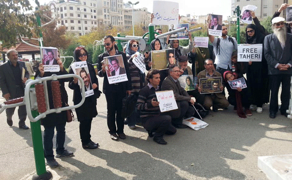 تجمع هوادران محمد علی طاهری مقابل زندان اوین ویورش گارد و نیروها ی امنیتی برای متفرق ساختن
