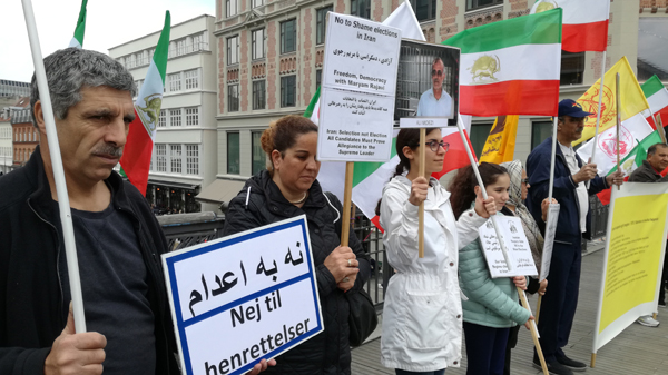 محکومیت نمایش انتخابات قلابی آخوندی در ایران - دانمارک